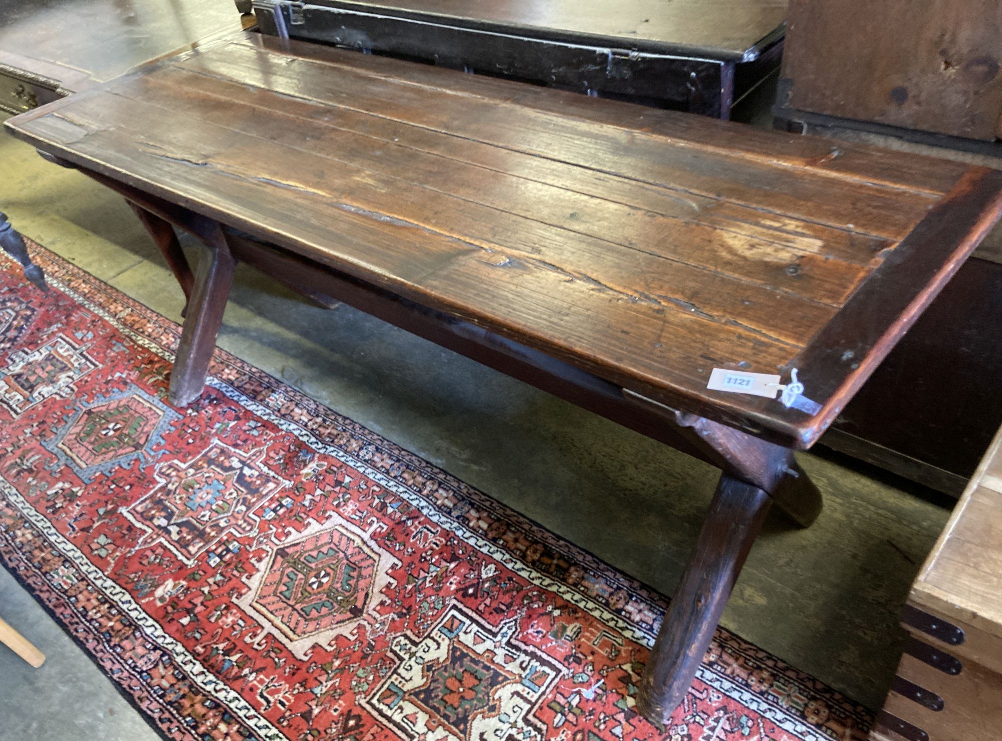 A 19th century pine refectory table, on trestle end supports, width 188cm, depth 68cm, height 77cm